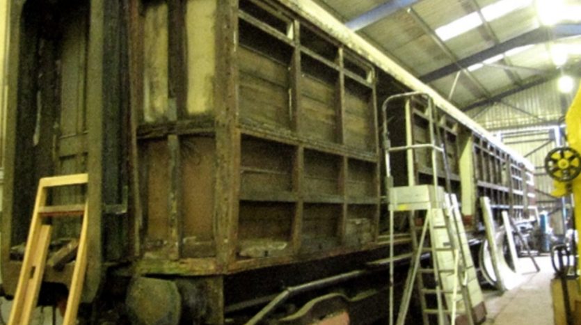 LNER pigeon van side stripped during restoration